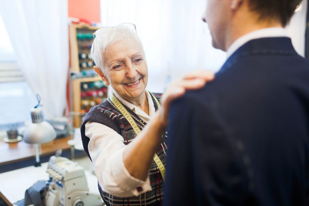 self-employed businesswoman helping a customer