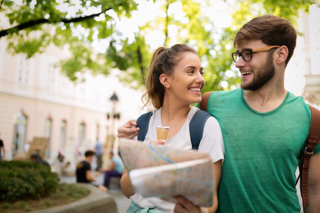 two young tourists with a map