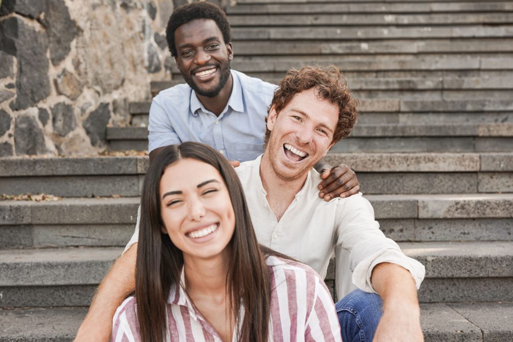 young people sitting on outdoor steps